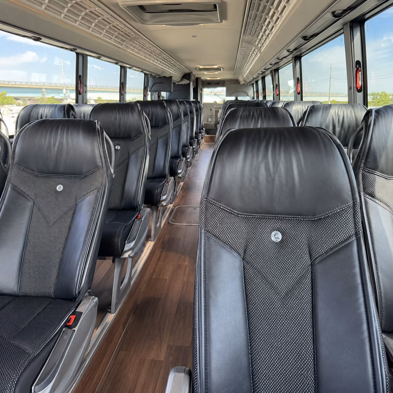 how distance and duration affect charter bus rates in dearborn