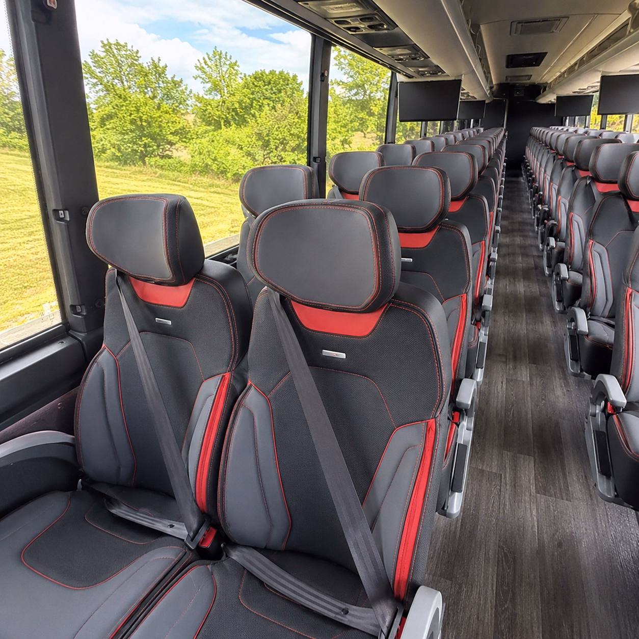 how starting location and deadhead miles affect charter bus rates in dearborn